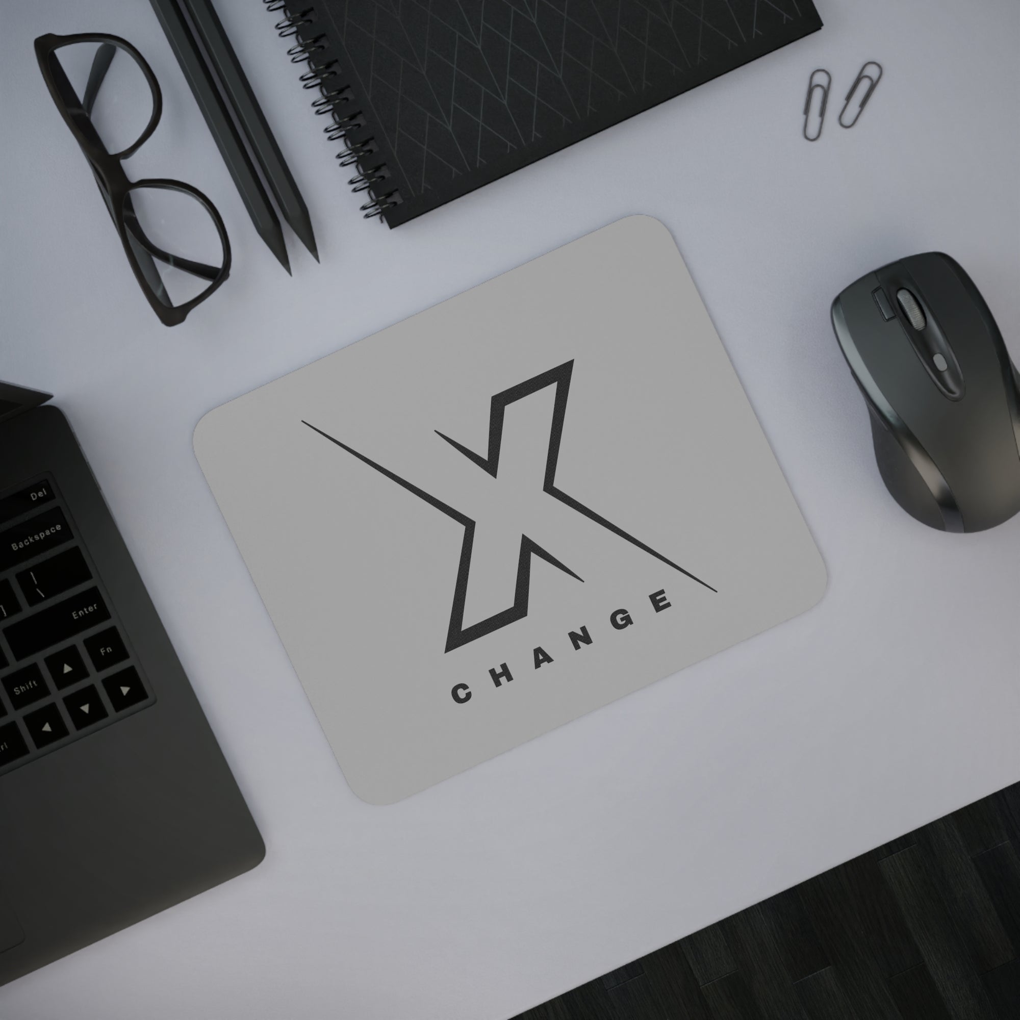 Sleek Modern Desk Mouse Pad with 'X CHANGE' Design